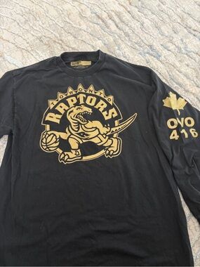 OVO Black Long Sleeve Raptors Logo Tee with Gold Graphics